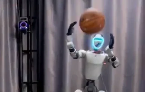 HumanX: Robots learn to box and play football from video